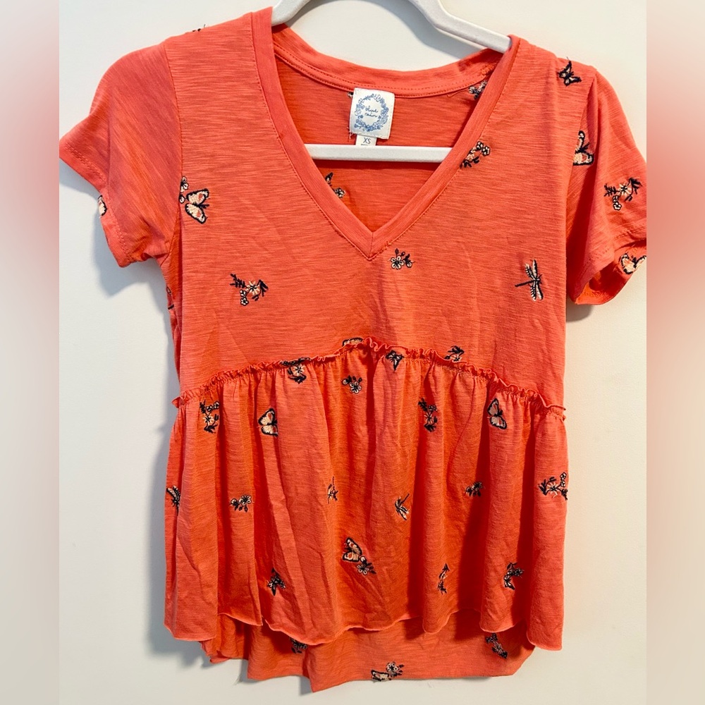 V-Neck Peplum Top with Butterfly Design